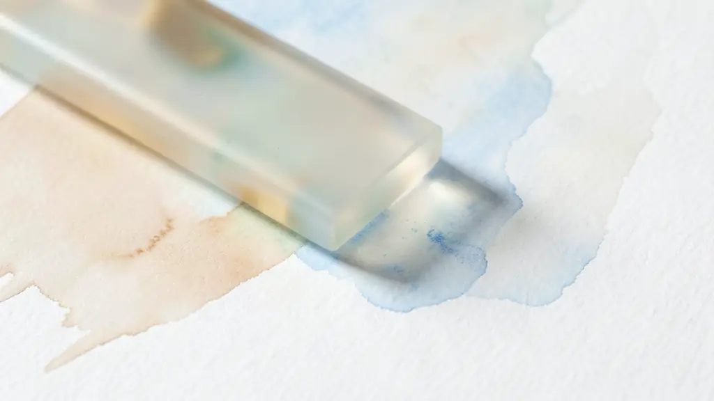Close-up editorial shot of materials: frosted opaline glass meeting polished brass details, soft diffused light, elegant textures